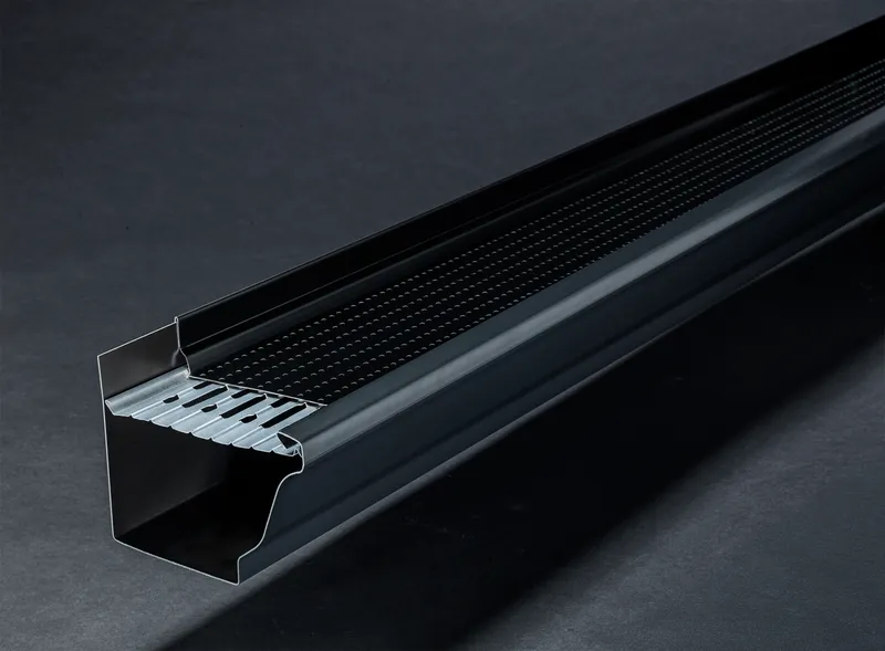 Black aluminum eavestrough with a continuous hanger